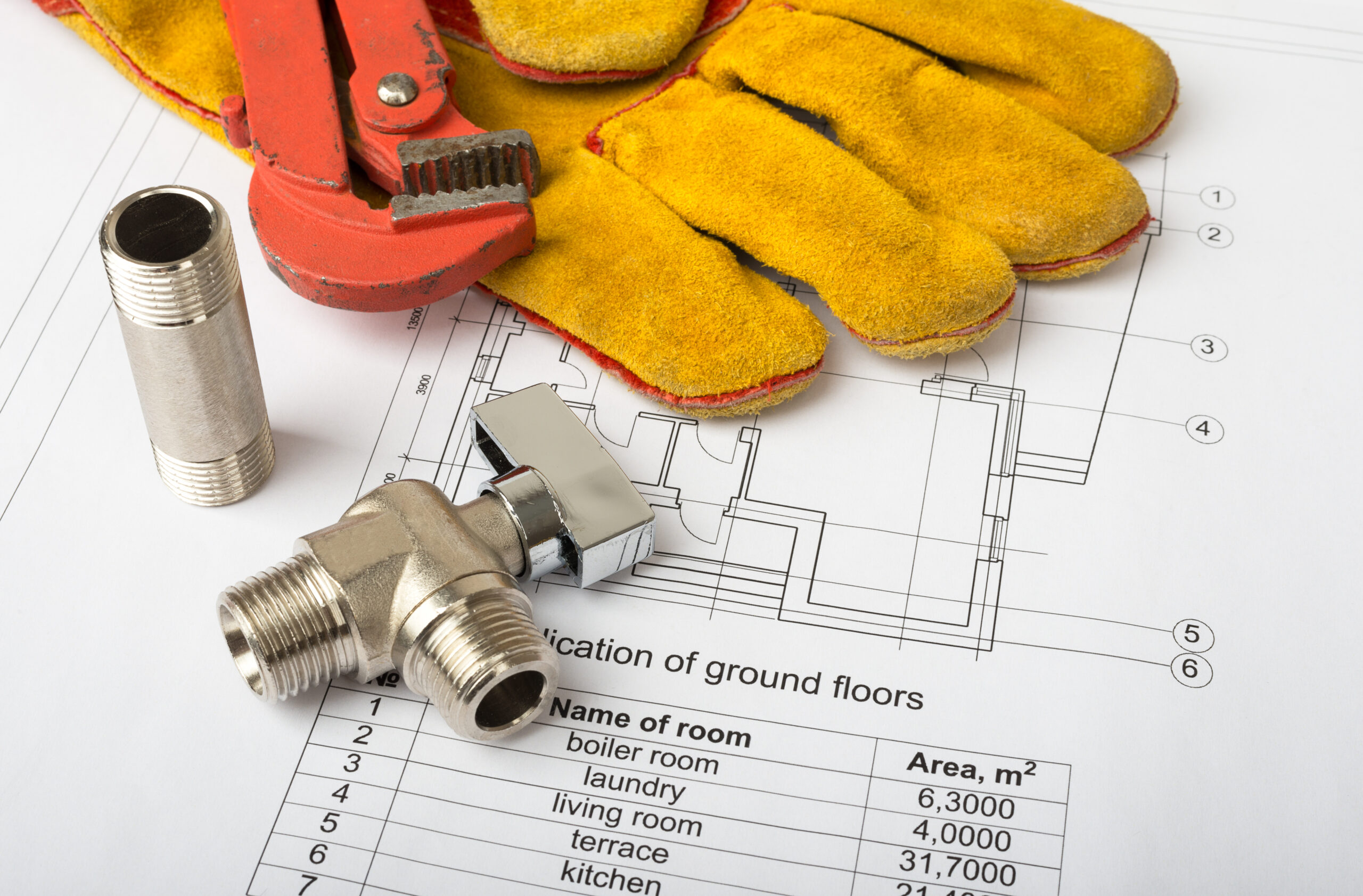 architecture-plan-and-rolls-of-blueprints-2025-10-16-19-25-59-utc